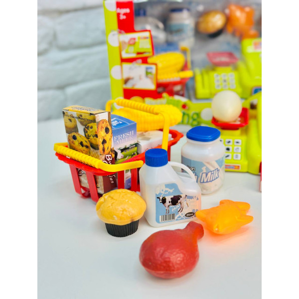 Касовий аппарат з кошиком і продуктами 