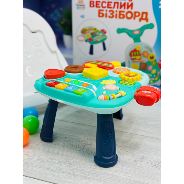 Розвиваючий центр 2в1 ходунки-каталка зі столиком 